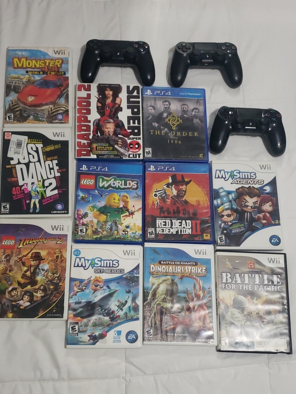Sony Black PS4 Wireless Controllers with Mixed Game Bundle